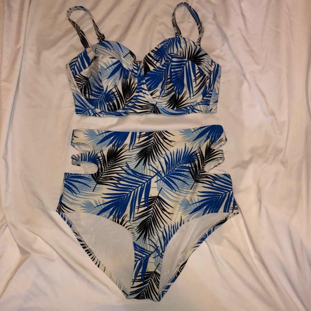 Blue and white tropical bathing suit